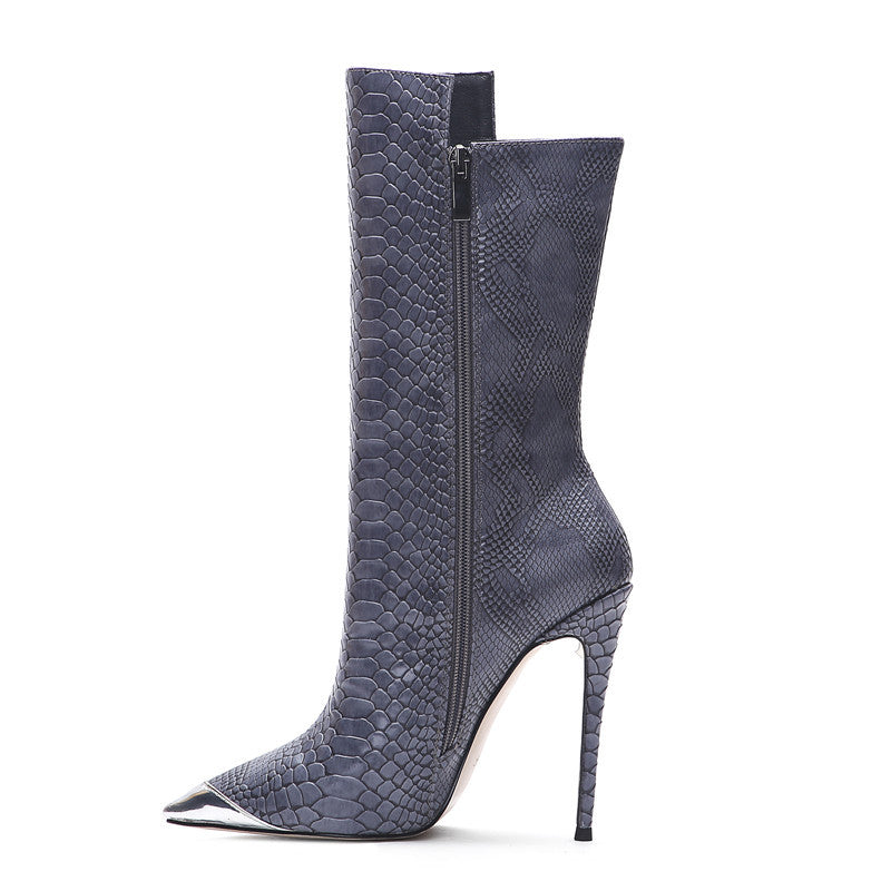 Botas stiletto de piel de serpiente con punta cromada