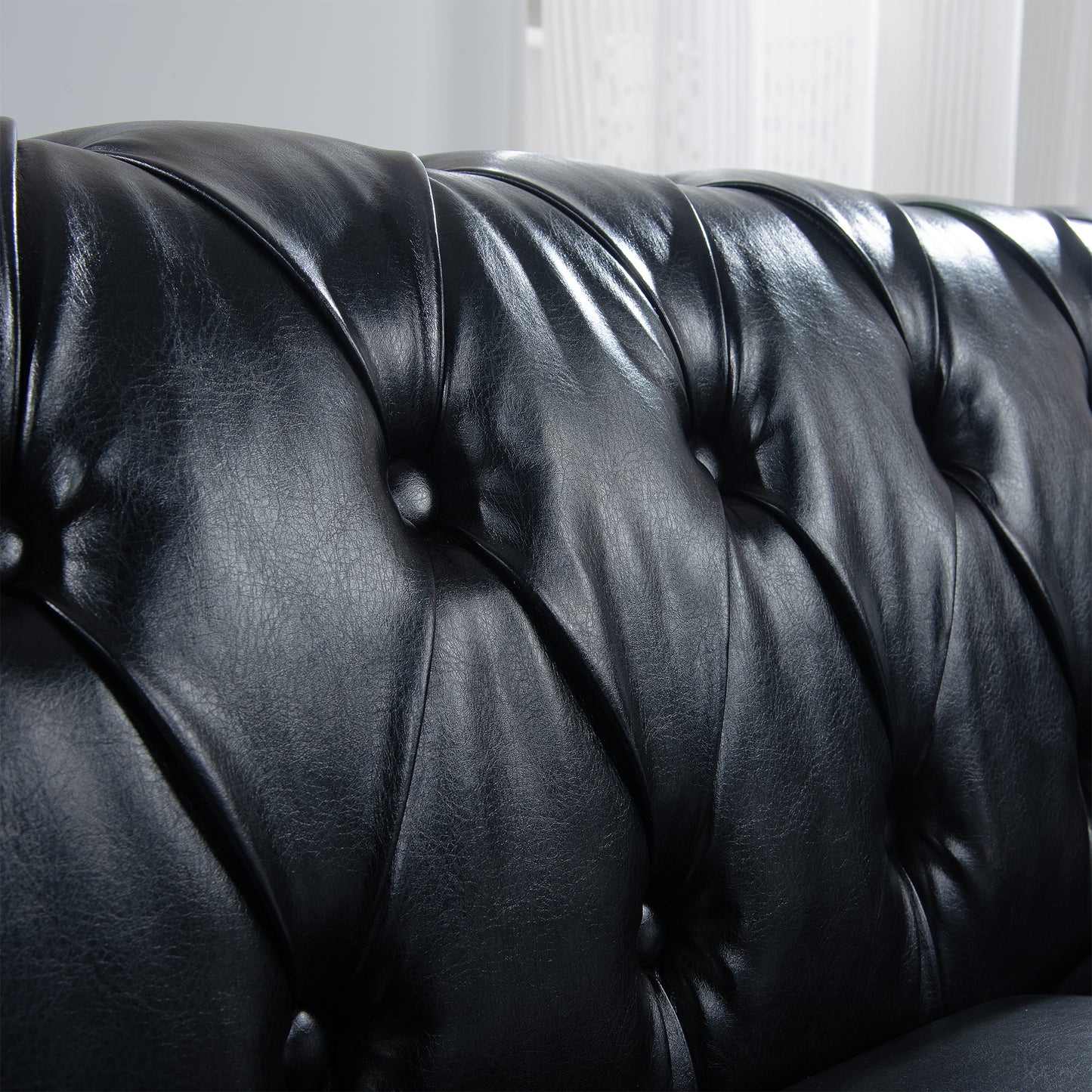 Sofá capitoné de cuero negro con ribete tipo clavo de 84,65"