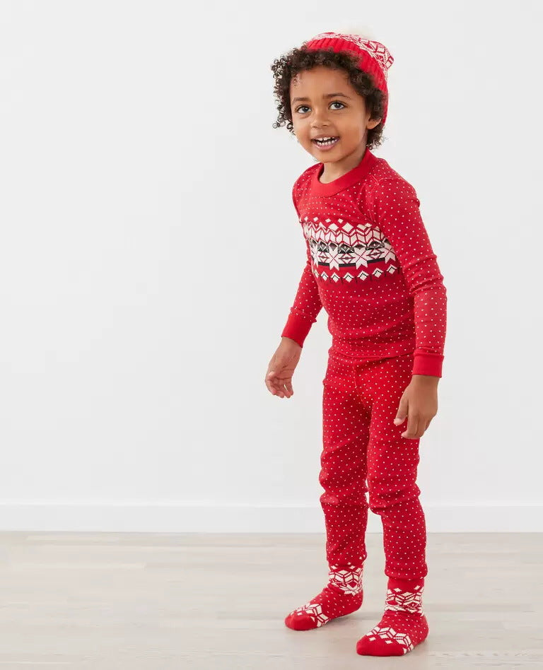 Pijamas familiares de invierno con copos de nieve