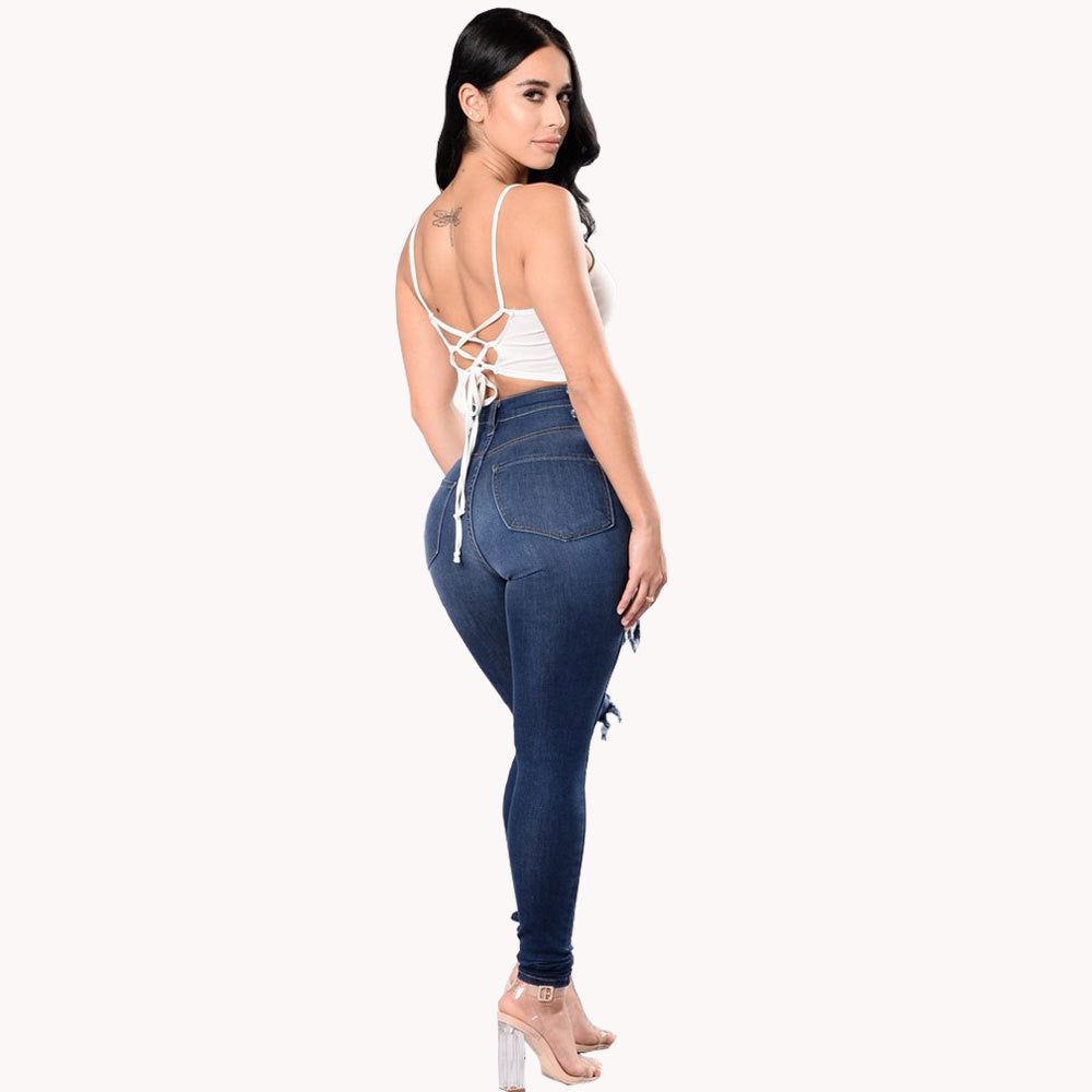 Vaqueros azules rasgados de talle alto para mujer