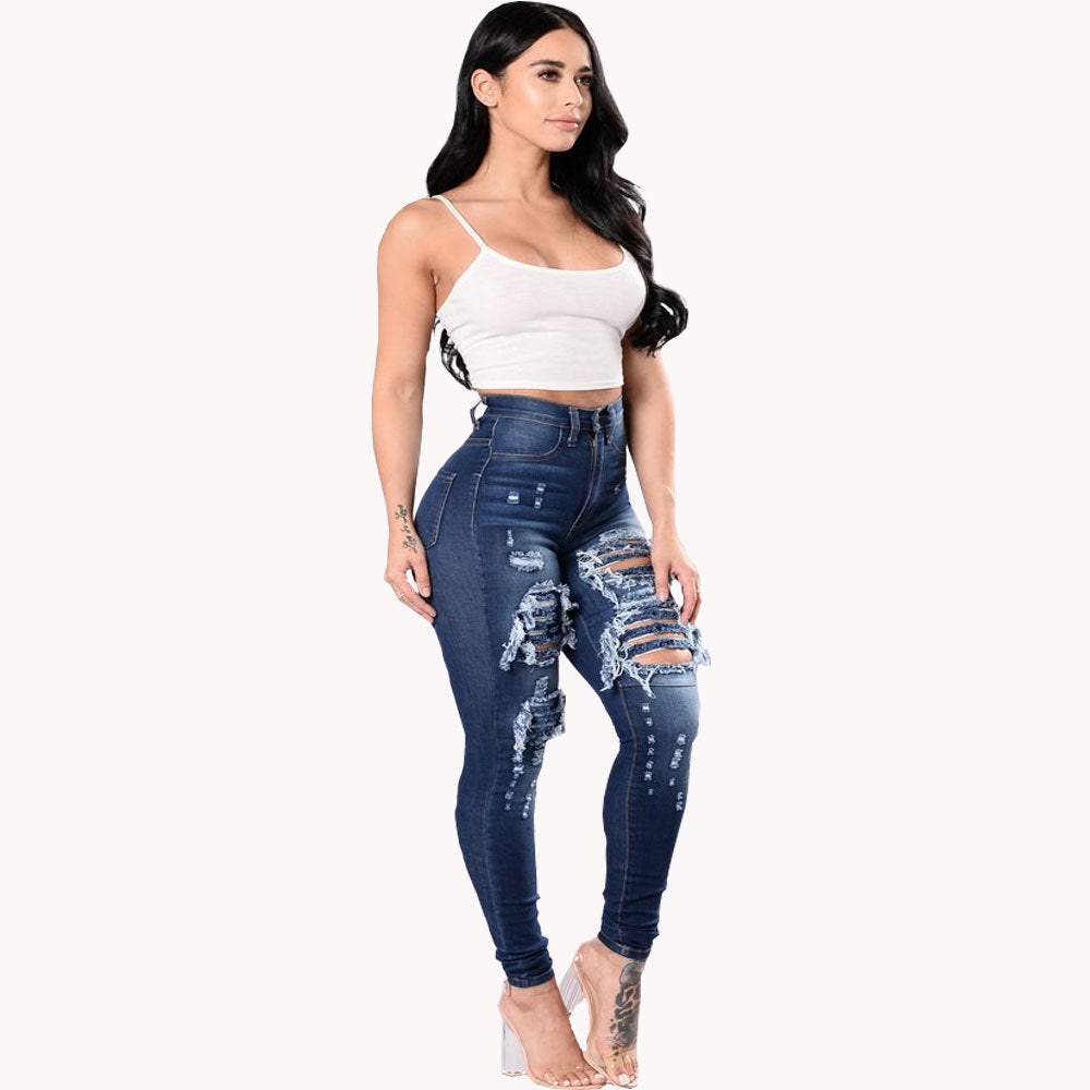Vaqueros azules rasgados de talle alto para mujer