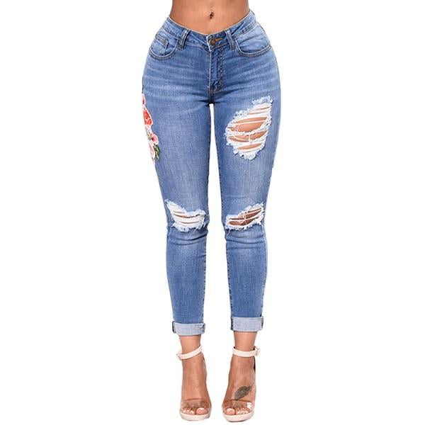 Jeans De Mezclilla Con Flores Azules Bordadas