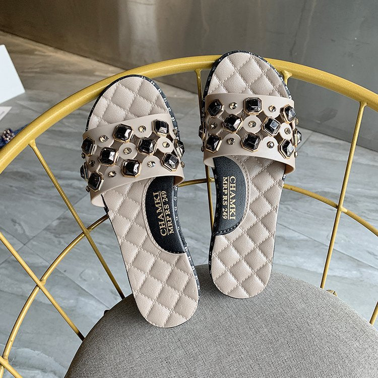 Flache Sandalen mit Schmucksteinen