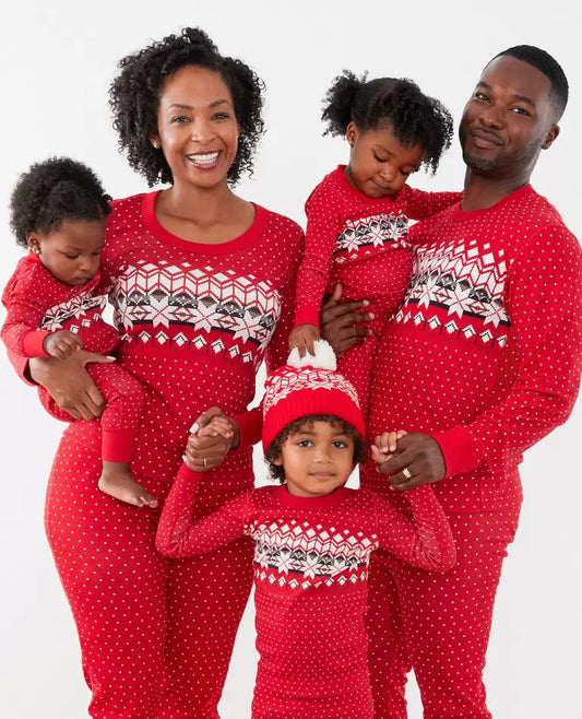 Pijamas familiares de invierno con copos de nieve