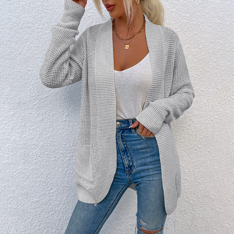 Knitted Curved Hem Double Pocket Sweater