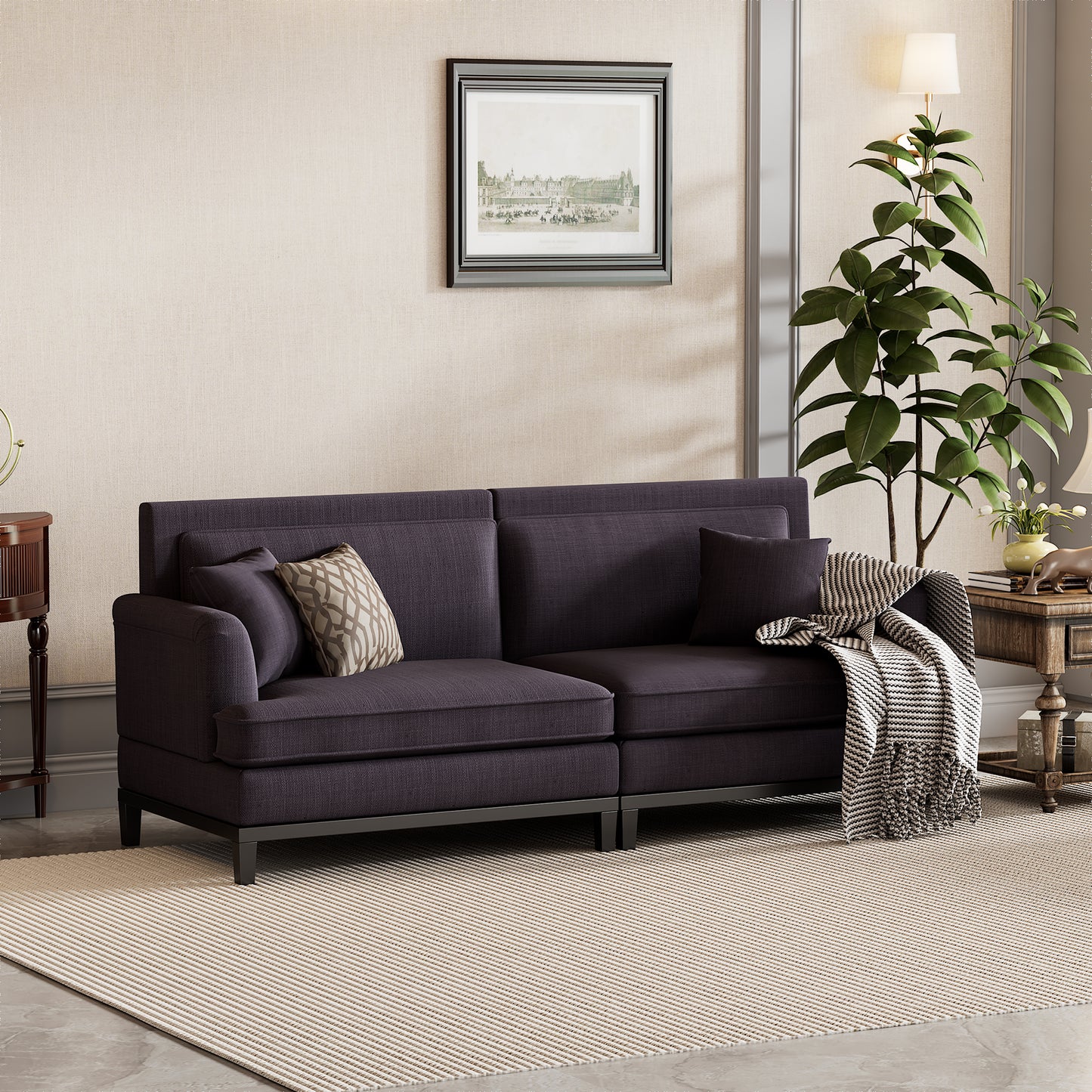 Sofá moderno tapizado en gris con patas de madera y dos cojines