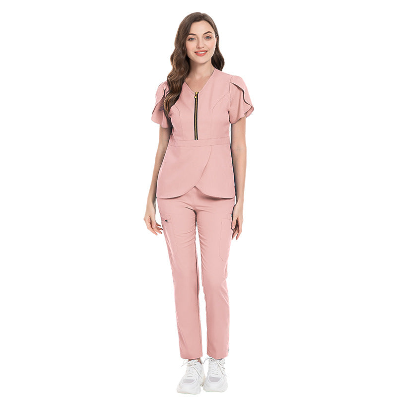 Uniforme médico con mangas de pétalos de rosa y cremallera para mujer