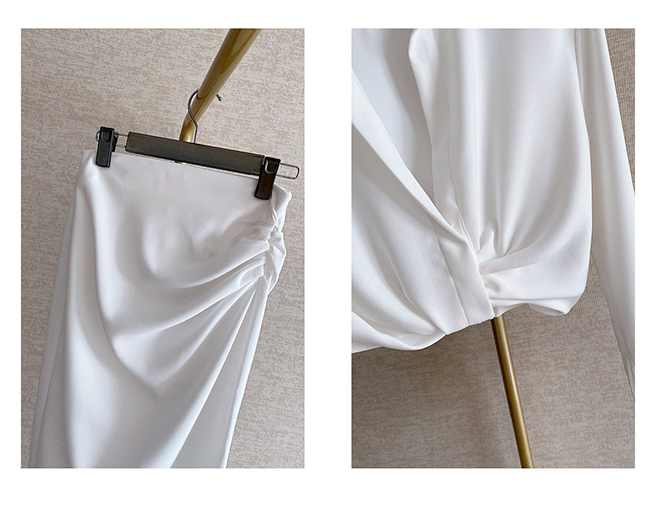 Conjunto de falda blanca de talle medio con abertura y manga larga recortada
